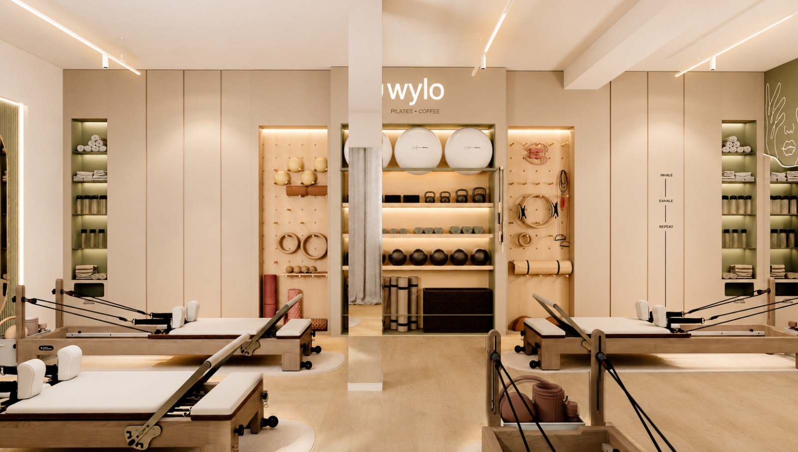 Symmetrical Wylo interior with the illuminated Pilates • Coffee sign